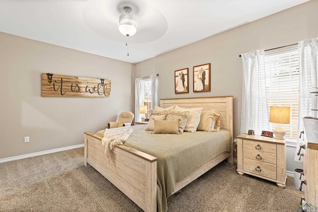 carpeted bedroom featuring ceiling fan