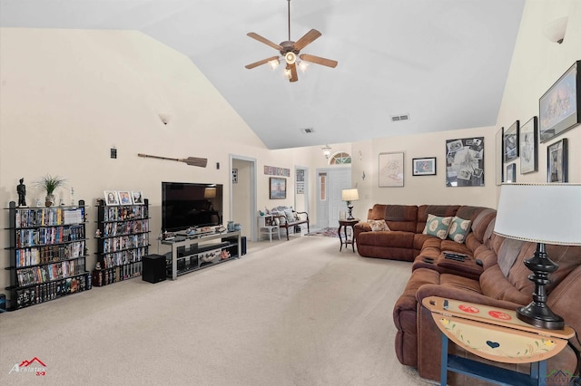 living area with visible vents, a ceiling fan, carpet, and high vaulted ceiling