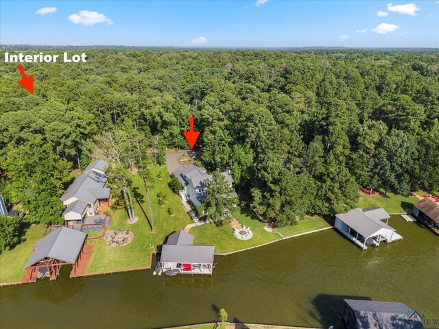 378 Cypress Creek Dr, Mount Vernon, TX 75457 - drone / aerial view of a heavily wooded area and a large body of water
