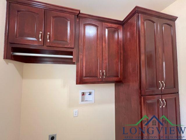 clothes washing area featuring washer hookup, cabinets, and hookup for an electric dryer