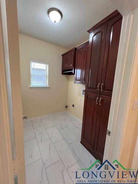 washroom with cabinets