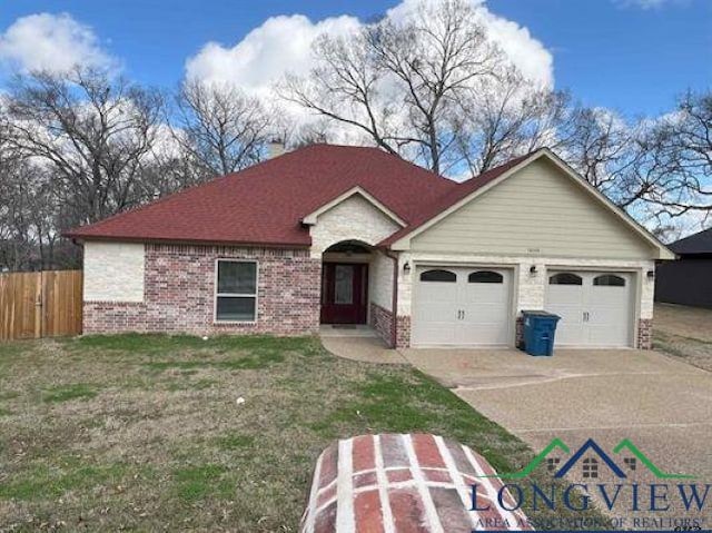 single story home featuring a garage