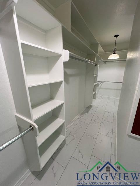 view of walk in closet