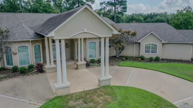 ranch-style house with a front yard