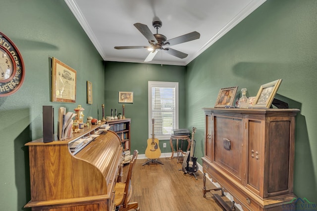 office area with ceiling fan, hardwood / wood-style flooring, and ornamental molding