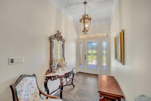 entrance foyer featuring crown molding