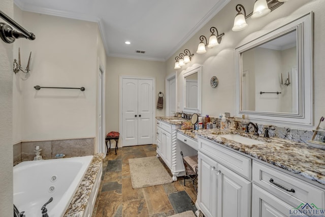 bathroom featuring a bath, vanity, and ornamental molding