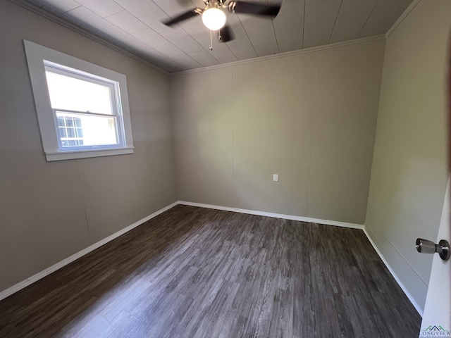 714 W Quitman Ave, Gladewater, TX 75647 - spare room with crown molding, wood finished floors, a ceiling fan, and baseboards