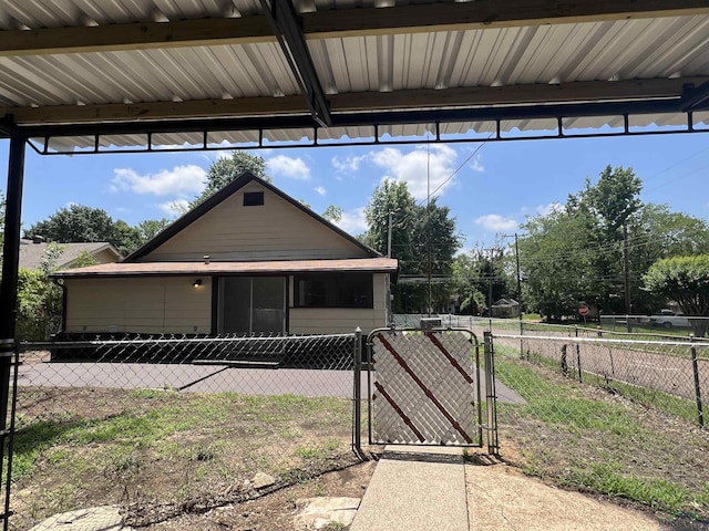 714 W Quitman Ave, Gladewater, TX 75647 - view of front of home with a gate