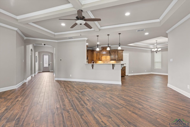 3363 Celebration Way, Longview, TX 75605 - unfurnished living room with a ceiling fan, plenty of natural light, dark wood finished floors, a chandelier, and beamed ceiling