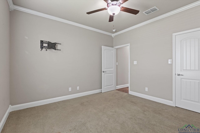 3363 Celebration Way, Longview, TX 75605 - unfurnished bedroom with crown molding, carpet flooring, and ceiling fan