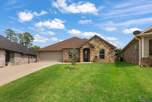 view of front of property featuring central AC, brick siding, a garage, a front yard, and driveway