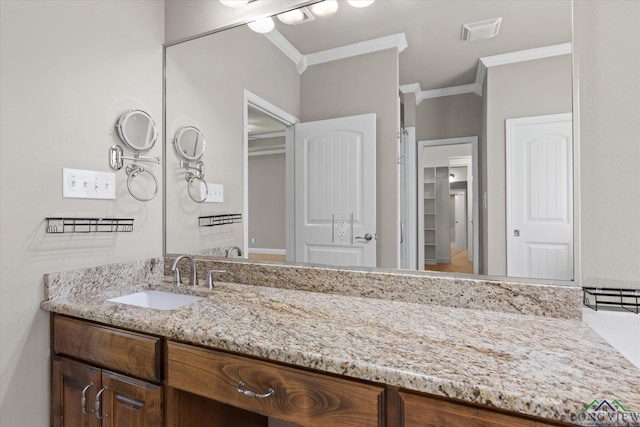 3363 Celebration Way, Longview, TX 75605 - bathroom featuring ornamental molding and vanity