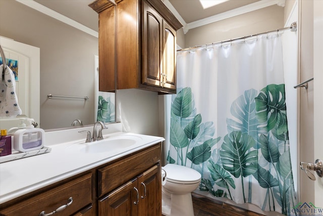 full bath with crown molding, vanity, toilet, and wood finished floors