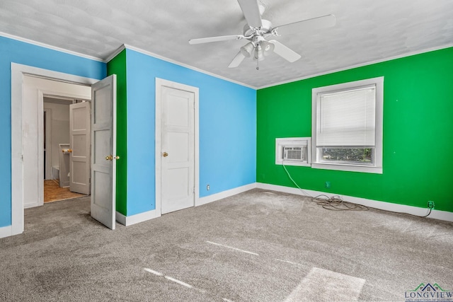 unfurnished bedroom with carpet, cooling unit, ceiling fan, and crown molding