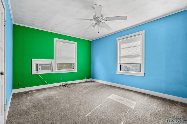 carpeted spare room featuring ceiling fan and cooling unit