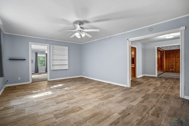 unfurnished room with built in shelves, ceiling fan, and crown molding