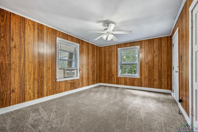 carpeted empty room with ceiling fan, cooling unit, and ornamental molding