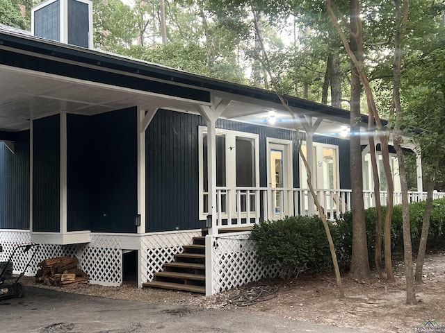 view of home's exterior featuring a sunroom