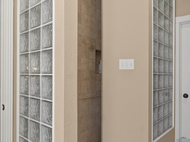 bathroom featuring walk in shower