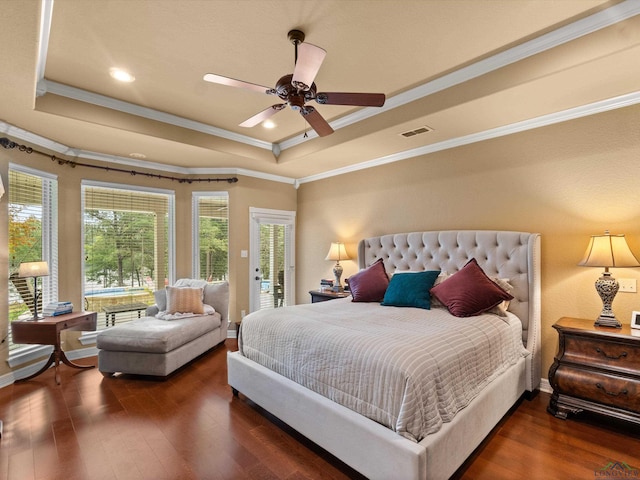 bedroom featuring dark hardwood / wood-style flooring, ornamental molding, access to outside, a raised ceiling, and ceiling fan