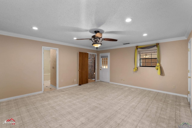 carpeted empty room with crown molding, ceiling fan, and a textured ceiling