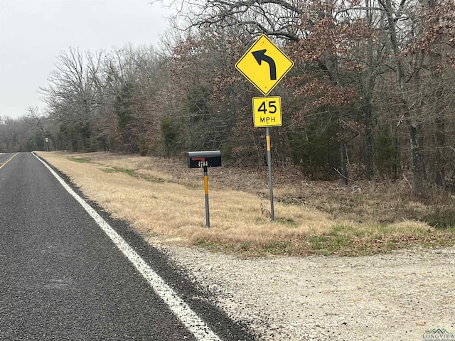 view of road featuring traffic signs