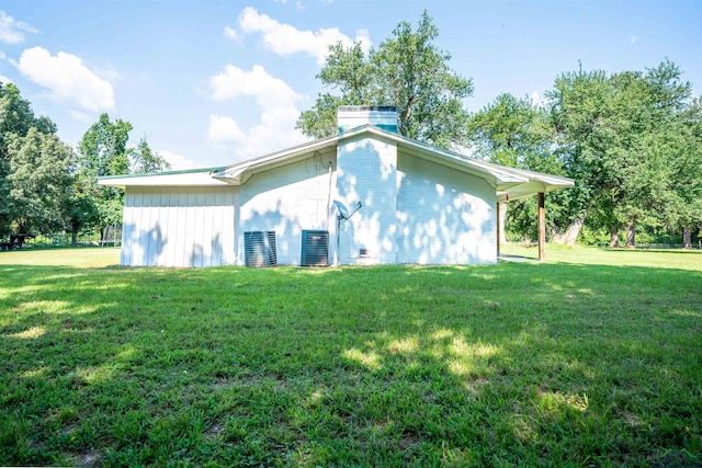 view of property exterior featuring a lawn