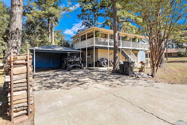 view of front of home with a carport