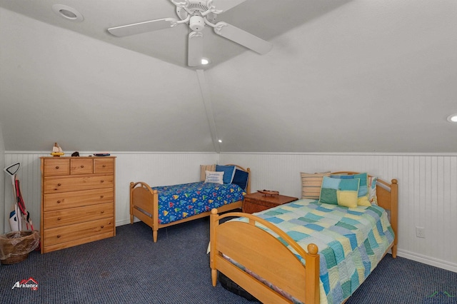 bedroom featuring vaulted ceiling, ceiling fan, and dark carpet