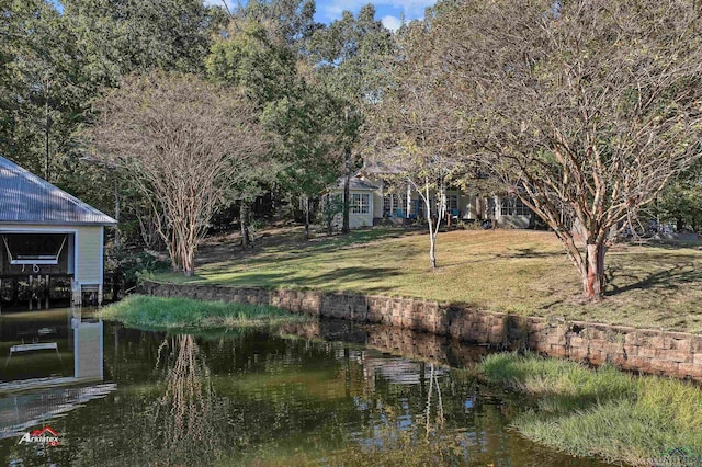 exterior space with a water view