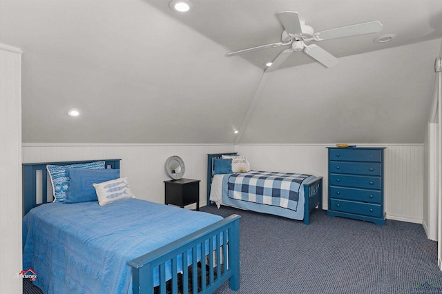 carpeted bedroom featuring vaulted ceiling and ceiling fan