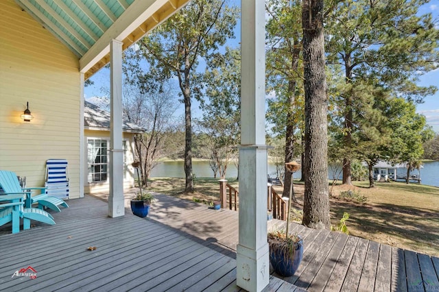 wooden deck with a water view