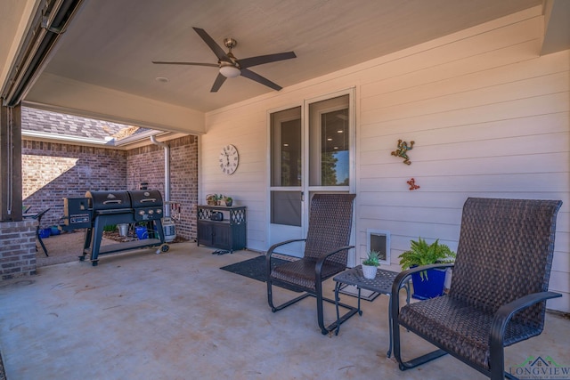 view of patio with ceiling fan and a grill