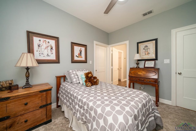 carpeted bedroom with ceiling fan