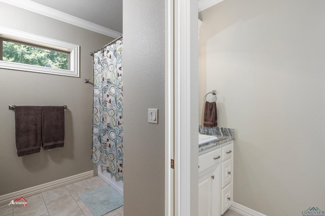 bathroom featuring tile patterned flooring, shower / bath combination with curtain, vanity, and ornamental molding