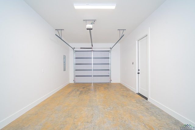 garage featuring electric panel and a garage door opener