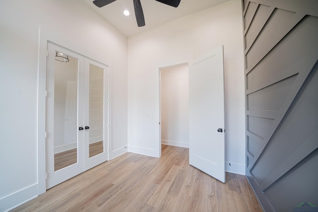 unfurnished bedroom with ceiling fan and light hardwood / wood-style floors