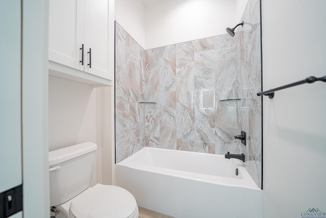 bathroom with tiled shower / bath combo and toilet