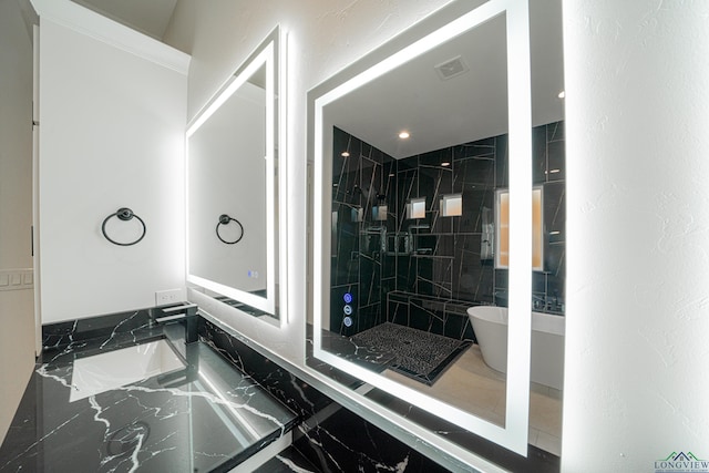 bathroom featuring a tile shower