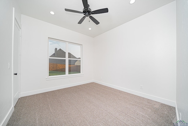 carpeted empty room with ceiling fan