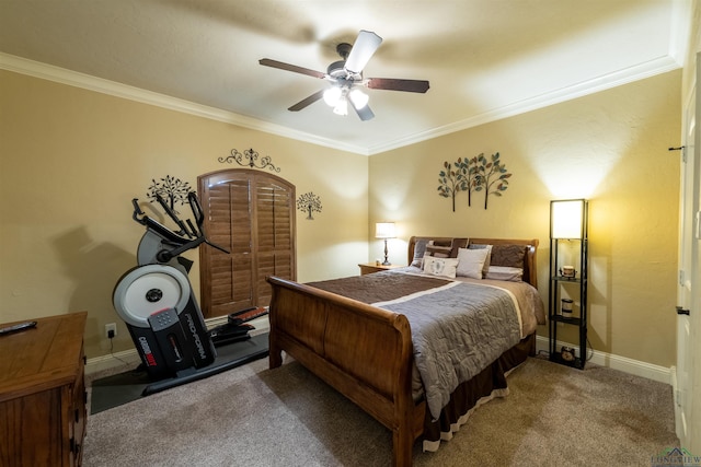 bedroom featuring carpet floors, ceiling fan, and crown molding