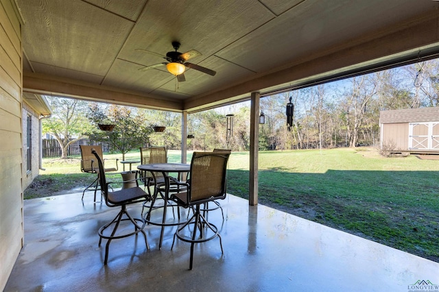 view of patio / terrace featuring a storage shed