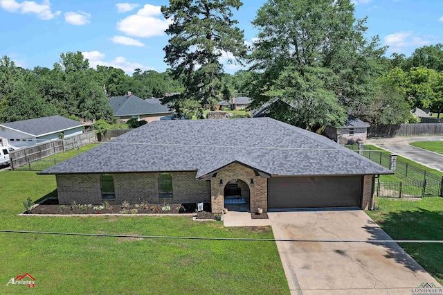 view of front of house with a shingled roof, brick siding, concrete driveway, and an attached garage