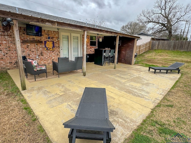 view of patio / terrace with fence