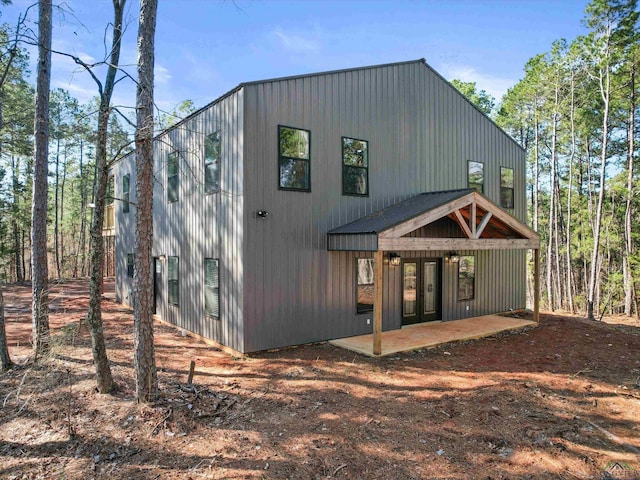 back of property featuring a patio