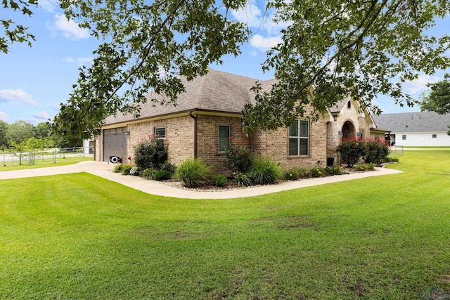 159 Jacobin Creek Dr, Gilmer, TX 75645 - view of front of property featuring brick siding, roof with shingles, a garage, and driveway