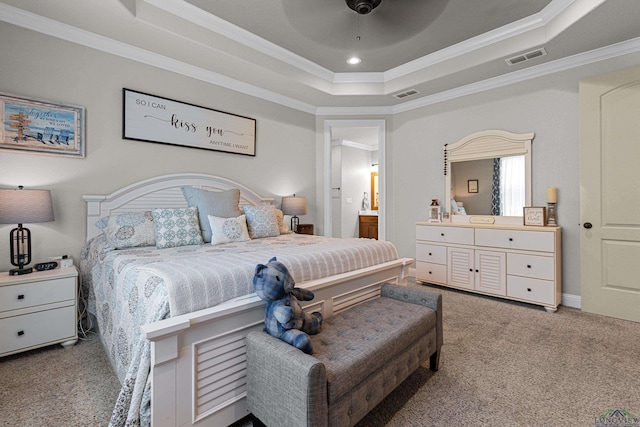 159 Jacobin Creek Dr, Gilmer, TX 75645 - carpeted bedroom featuring a tray ceiling, ornamental molding, ceiling fan, ensuite bathroom, and recessed lighting