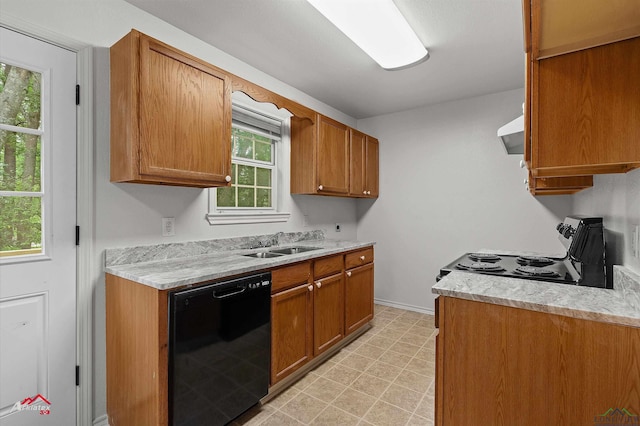 209 Norton Dr, Longview, TX 75602 - kitchen with black dishwasher, electric stove, wall chimney exhaust hood, a sink, and light countertops