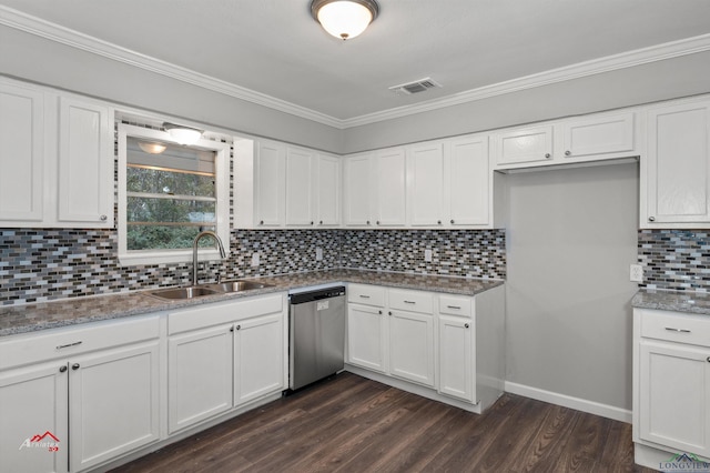 kitchen featuring dark hardwood / wood-style floors, dishwasher, sink, white cabinets, and decorative backsplash